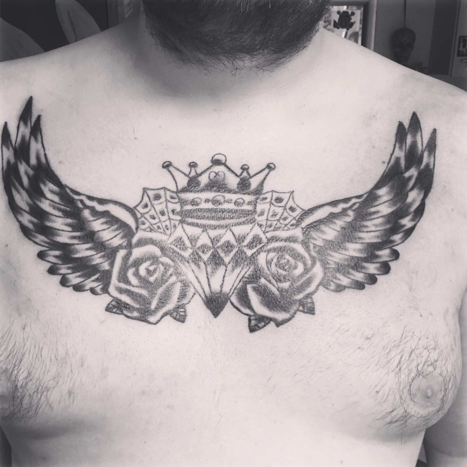Wing Tattoo Designs on Chest | Cool chest tattoos, Chest tattoo men, Wing  tattoo designs